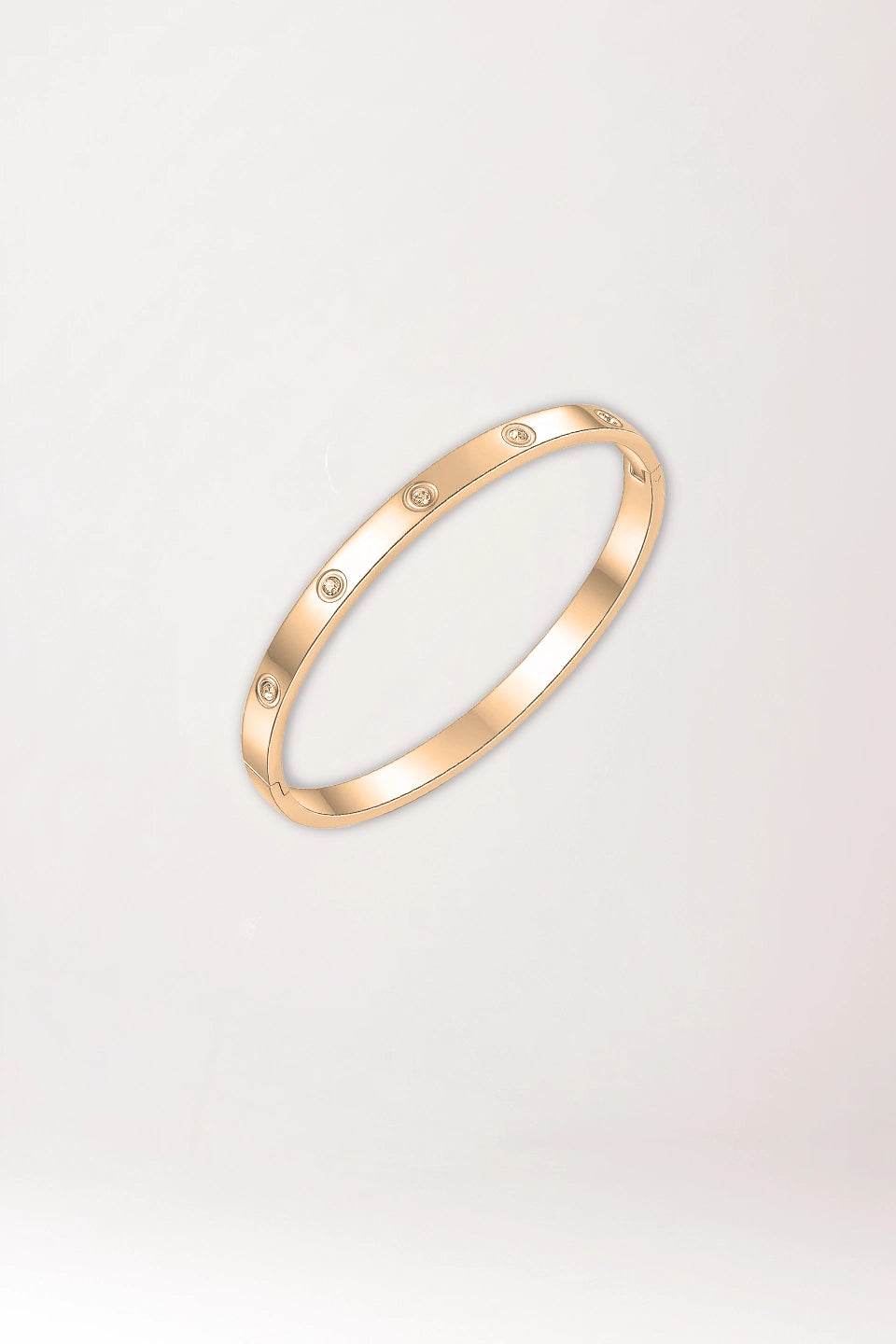 Pulsera dorada de acero y circonitas