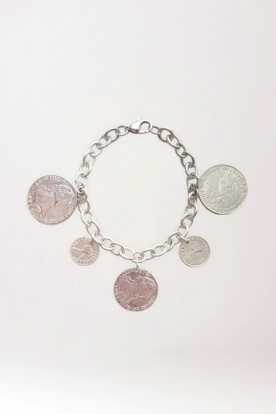 Pulsera de monedas variadas de plata de ley rodiada 925