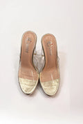 Sandalia dorada con tacón transparente